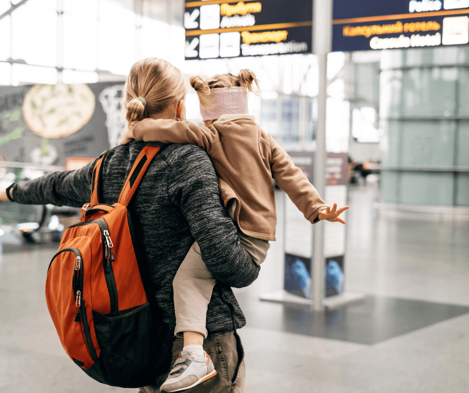 mother and child at airport terminal